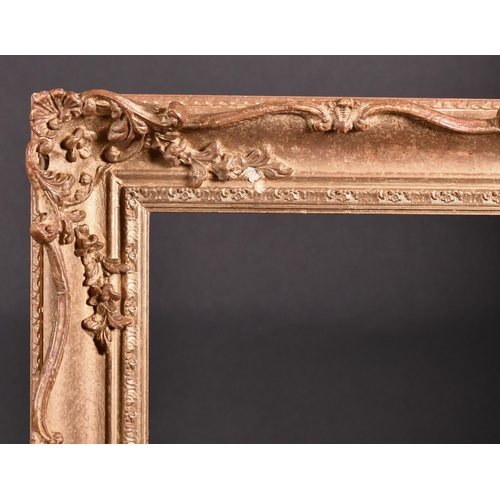 316 - 20th Century English School. A Gilt Composition Frame, with swept and pierced centres and corners, r... 