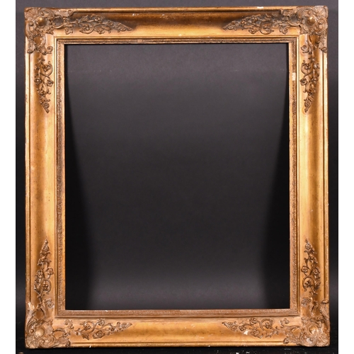 354 - 19th Century French School. A Gilt Composition Frame, with swept corners, rebate 25.5