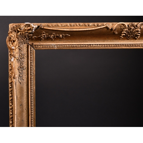 358 - 19th Century English School. A Gilt Composition Frame, with swept centres and corners, rebate 25.5