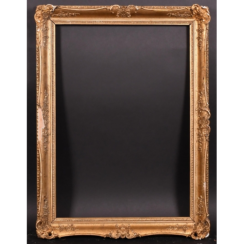 358 - 19th Century English School. A Gilt Composition Frame, with swept centres and corners, rebate 25.5