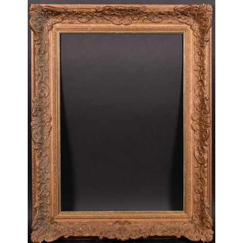 363 - 20th Century English School. A Gilt Composition Frame, with swept centres and corners, rebate 25