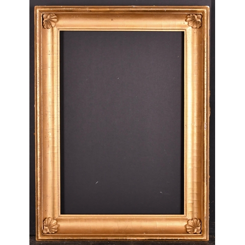 385 - Early 19th Century English School. A Hollow Gilt Frame, with shell decorative corners, rebate 22