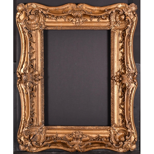 393 - 19th Century English School. A Carved Giltwood Frame, with swept centres and corners, rebate 21