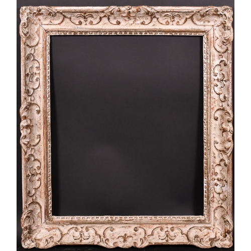 398 - 20th Century French School. A Painted Carved Wood Frame, with swept centres and corners, rebate 20