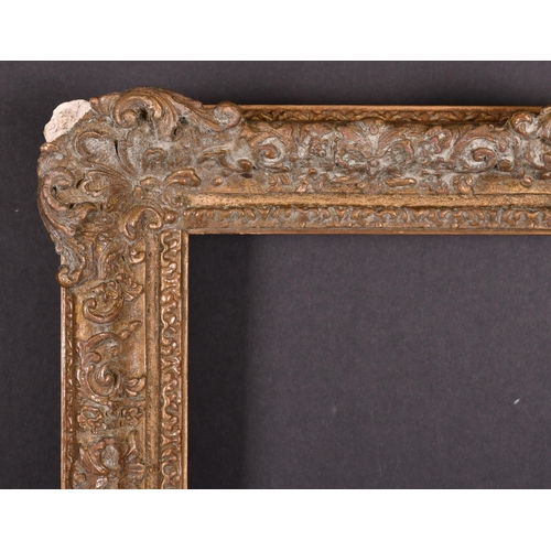 400 - 20th Century English School. A Gilt Composition Frame, with swept centres and corners, rebate 20