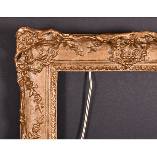 423 - 20th Century English School. A Painted Composition Frame, with swept and pierced centres and corners... 