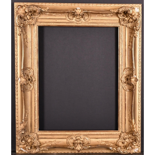 442 - 19th Century English School. A Gilt Composition Frame, with swept centres and corners, rebate 15.5