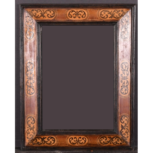 462 - 19th Century English School. An Inlaid Wooden Frame, with inset mirror glass, rebate 12