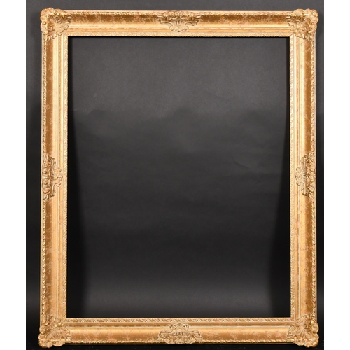 325 - 20th Century English School. A Gilt Composition Frame, with swept centres and corners, rebate 31