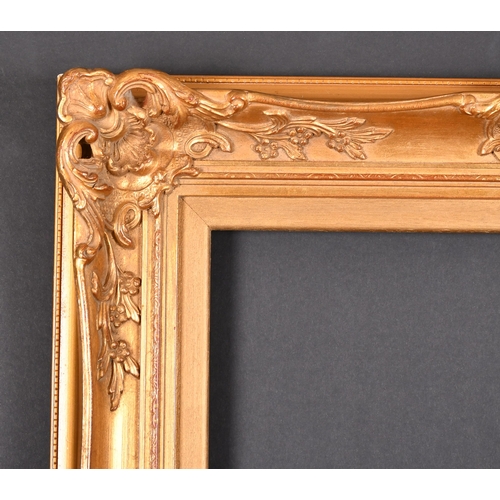 366 - 20th Century English School. A Gilt Composition Frame with swept and pierced centres and corners, re... 