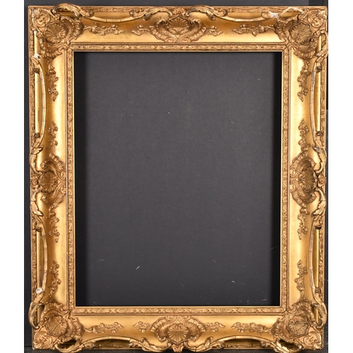 393 - 19th Century English School. A Gilt Composition Frame, with swept centres and corners, rebate 20.5