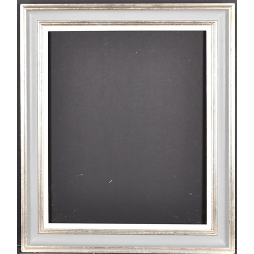 406 - 20th-21st Century English School. A Painted Frame with silver inner and outer edges and a white slip... 