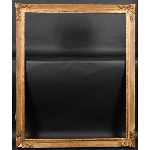 318 - 20th Century English School. A Gilt and Painted Composition Frame, with swept corners, rebate 45