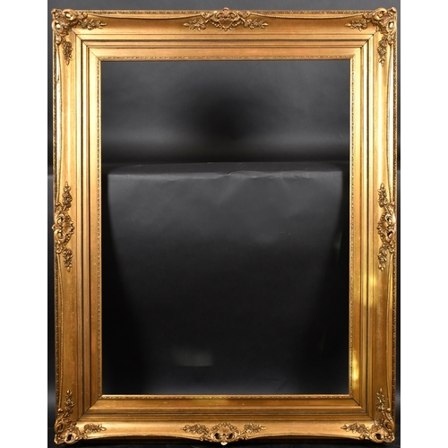 330 - 20th Century European School. A Gilt Composition Frame, with swept and pierced centres and corners, ... 