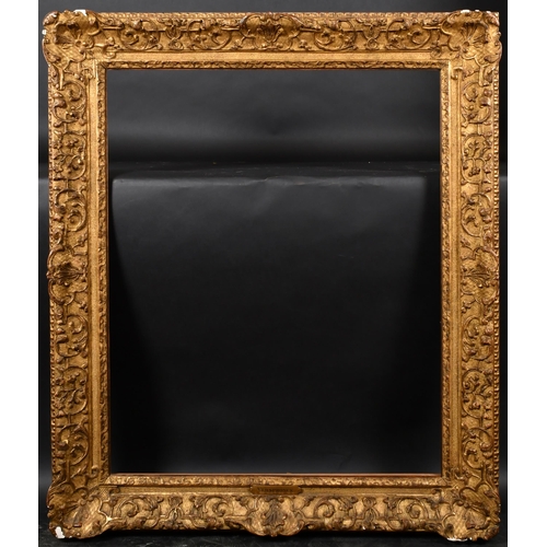 341 - 19th Century French School. A Gilt Composition Louis Style Frame, with swept centres and corners, re... 