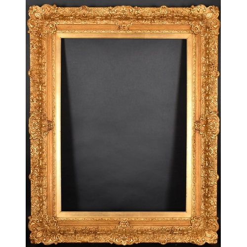 344 - 19th Century English School. A Gilt Composition Frame, with swept centres and corners, rebate 32.5