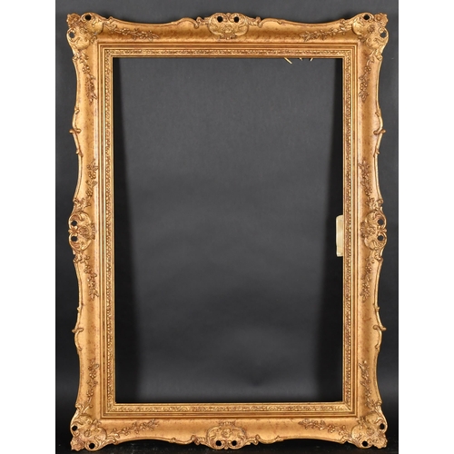 363 - 20th-21st Century English School. A Gilt Composition Frame, with swept and pierced centres and corne... 