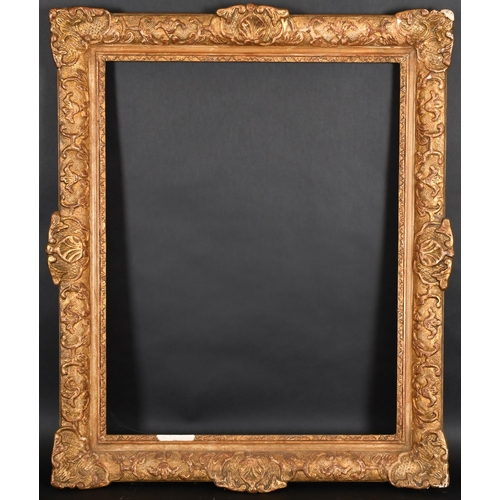 374 - 20th Century French School. A Louis Style Gilt Composition Frame, with swept centres and corners, re... 