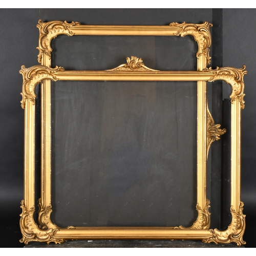 384 - 19th Century English School. A Pair of Horizontal Gilt Composition Frames, with a central ornament a... 