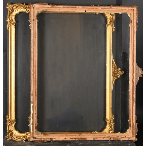 384 - 19th Century English School. A Pair of Horizontal Gilt Composition Frames, with a central ornament a... 