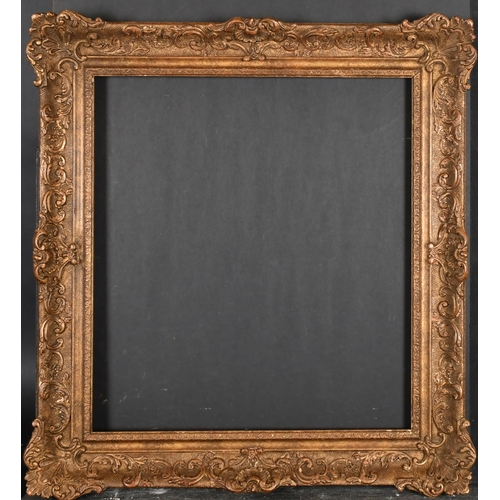 433 - 20th Century English School. A Gilt and Painted Composition Frame, with swept centres and corners, r... 