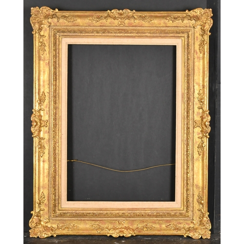 437 - 20th Century English School. A Gilt Composition Frame, with swept centres and corners and a fabric s... 