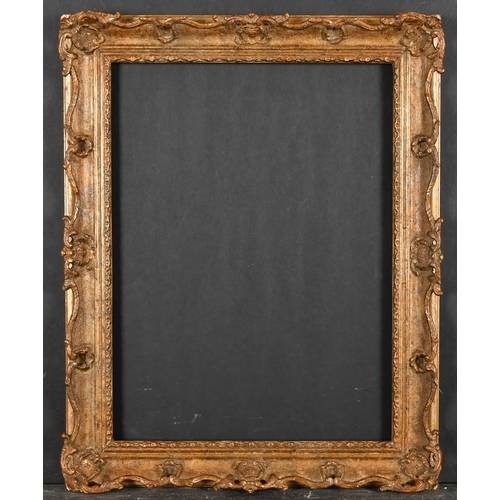 459 - 20th Century English School. A Gilt Composition Frame, with swept and pierced centres and corners, r... 