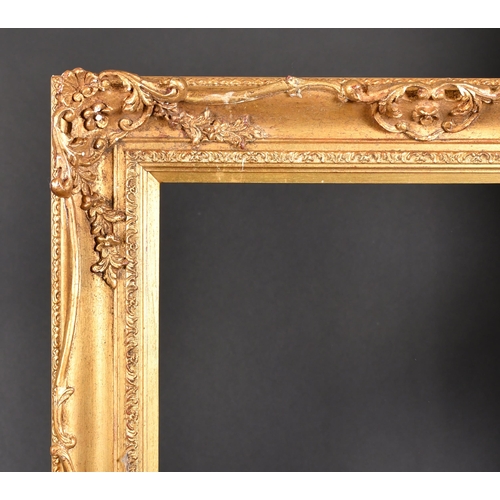 313 - 20th Century English School. A Gilt Composition Frame, with swept and pierced centres and corners, r... 