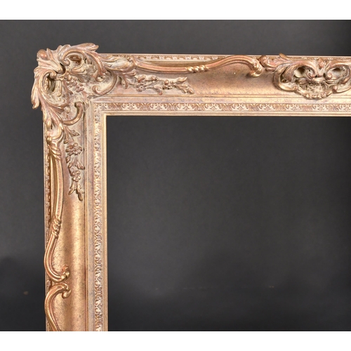 321 - 20th Century English School. A Gilt Composition Frame, with swept and pierced centres and corners, r... 