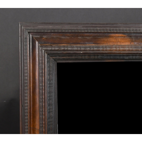 353 - 20th Century English School. An Ebonised Wooden Frame, with inset mirror glass, rebate 33