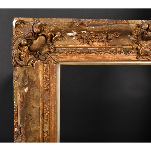 379 - 19th Century English School. A Gilt Composition Frame, with swept centres and corners and a silver s... 