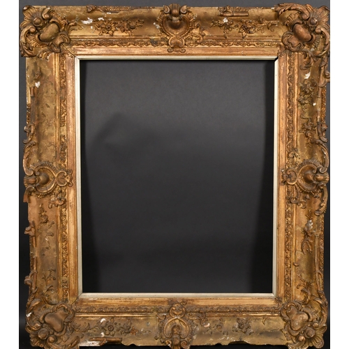 379 - 19th Century English School. A Gilt Composition Frame, with swept centres and corners and a silver s... 