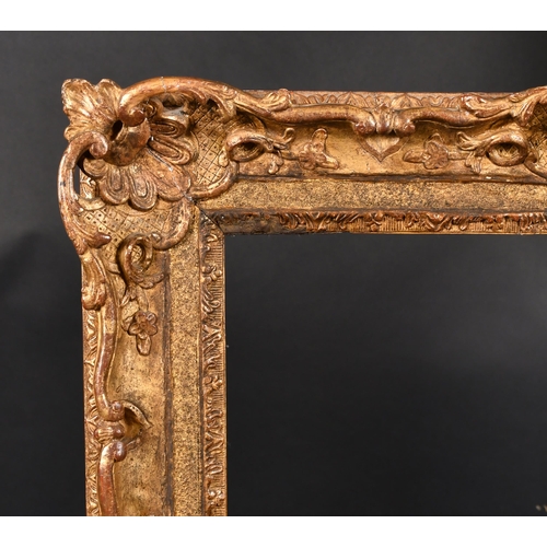 385 - 19th Century French School. A Louis Style Gilt Composition Frame, with swept and pierced centres and... 