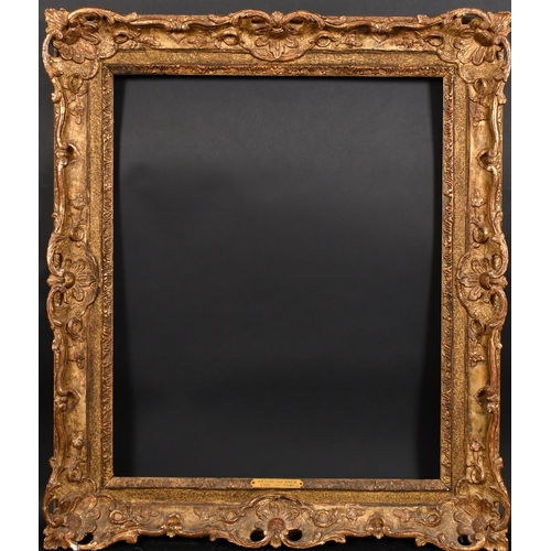 385 - 19th Century French School. A Louis Style Gilt Composition Frame, with swept and pierced centres and... 