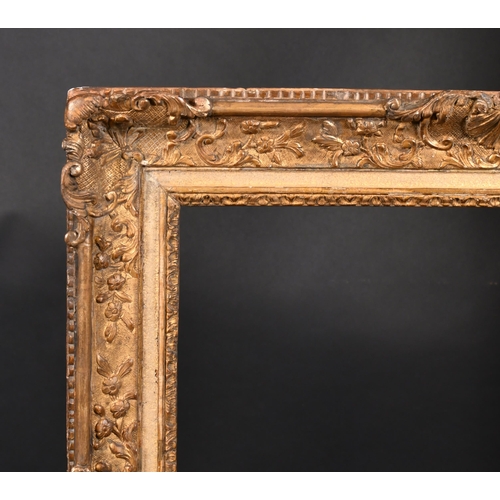 400 - 18th Century French School. A Carved Giltwood Regence Frame, with swept centres and corners, rebate ... 