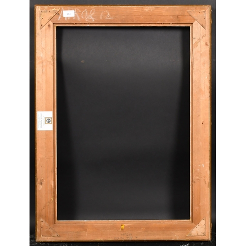 404 - 20th Century European School. A Gilt Composition Frame, with swept centres and corners, rebate 27