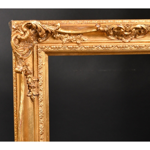 406 - 20th Century English School. A Gilt Composition Frame, with swept and pierced centres and corners, r... 