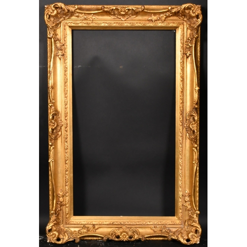 406 - 20th Century English School. A Gilt Composition Frame, with swept and pierced centres and corners, r... 