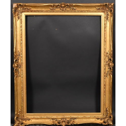 417 - 20th Century English School. A Gilt Composition Frame, with swept and pierced centres and corners, r... 