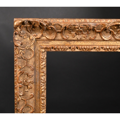 447 - 18th Century French School. A Carved Giltwood Regence Frame, with swept centres and corners, rebate ... 