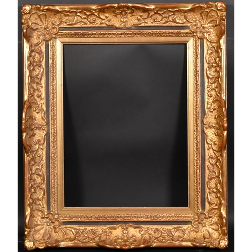 471 - 20th Century French School. A Louis Style Gilt Composition Frame, with swept centres and corners, re... 