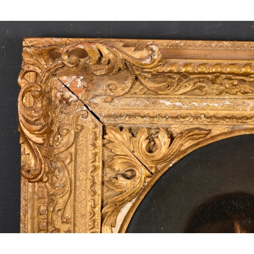 50 - 18th Century English School. Bust Portrait of a Young Lady, Oil on canvas, In a fine carved giltwood... 