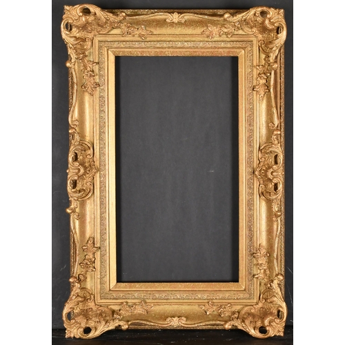 504 - 20th Century English School. A Gilt Composition Frame, with swept and pierced centres and corners, r... 