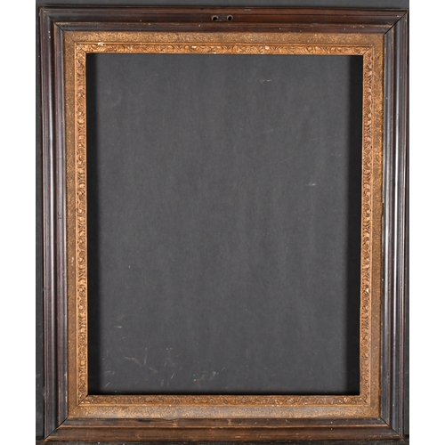 511 - 18th Century English School. A Darkwood Frame, with a carved giltwood slip, rebate 16.75