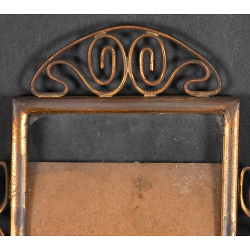 596 - 20th Century English School. An Ornate Metal Photograph Frame, rebate 6.75