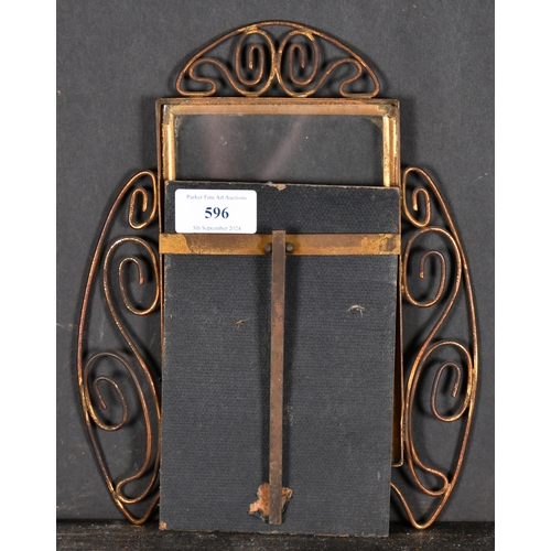 596 - 20th Century English School. An Ornate Metal Photograph Frame, rebate 6.75