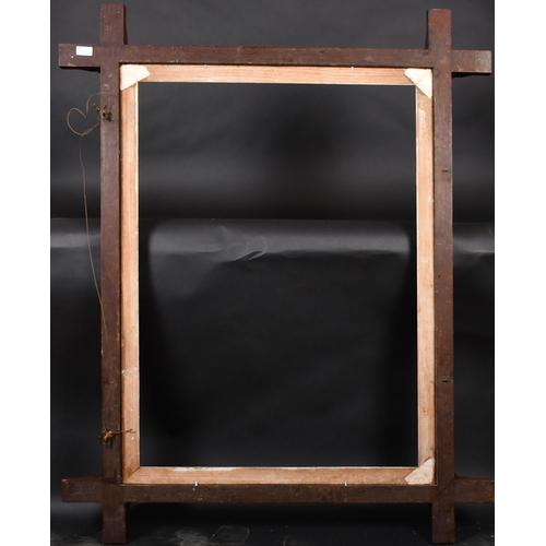 307 - Early 20th Century English School. An Arts and Crafts style wooden frame with a gilt slip, rebate 39... 