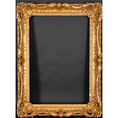 324 - 19th Century English School. A Gilt Composition Frame, with swept and pierced centres and corners, r... 