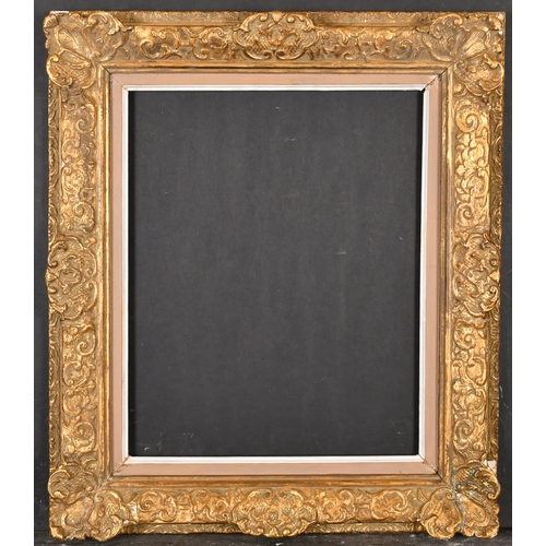 373 - 20th Century European School. A Gilt Composition Frame with swept centres and corners and a painted ... 