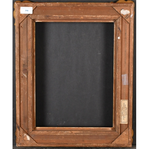 398 - 20th Century French School. A Gilt Composition Frame with swept centres and corners, rebate 14